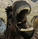 a close up of a person 's face with a blurred background .