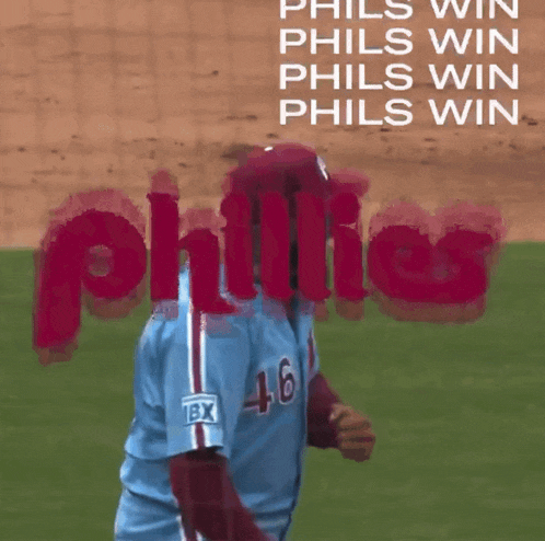 a phillies player wearing a blue jersey with the number 46 on it