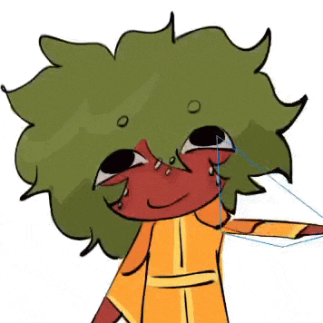 a cartoon character with green hair and a yellow shirt is smiling and crying .