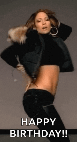 a woman in a crop top is dancing with the words `` happy birthday '' written on the bottom .