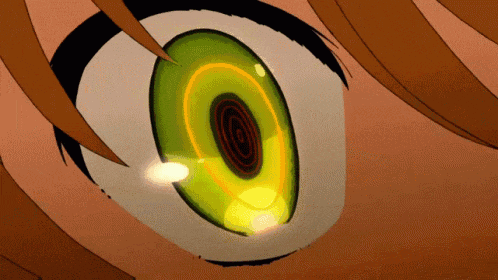a close up of a person 's eye with a yellow circle in the middle