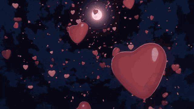 a heart shaped balloon is floating in the night sky