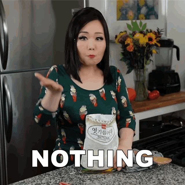 a woman is holding a bag of nothing in front of her