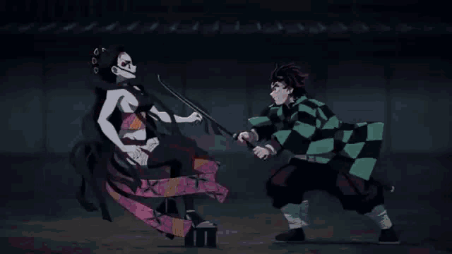 a man and a woman are fighting each other with a sword and a flame dance .