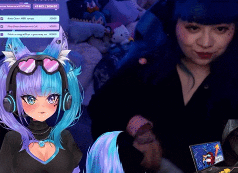 a girl wearing headphones and a heart shaped heart on her chest is playing a video game