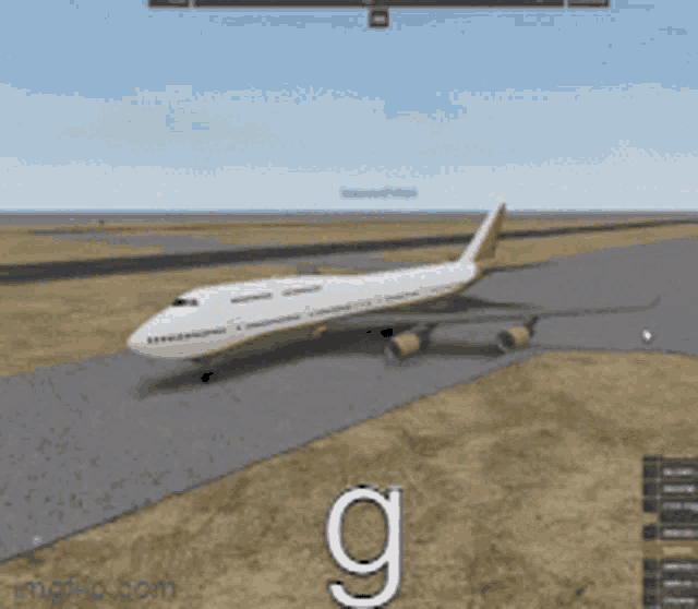 an airplane is sitting on a runway with the letter g on the ground
