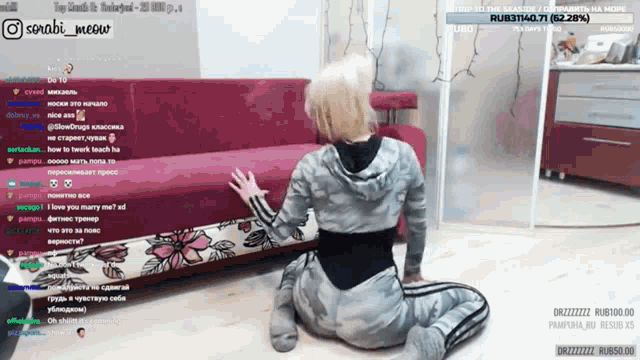 a woman is kneeling down in front of a couch with a watermark that says sonabi_meow on it
