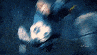 a soccer player with the number 8 on his jersey is kicking the ball