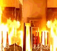 a room with a lot of candles on a table