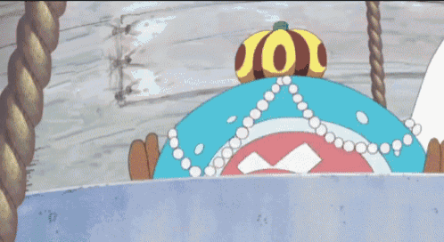 a cartoon character wearing a pink and blue hat with a cross on it