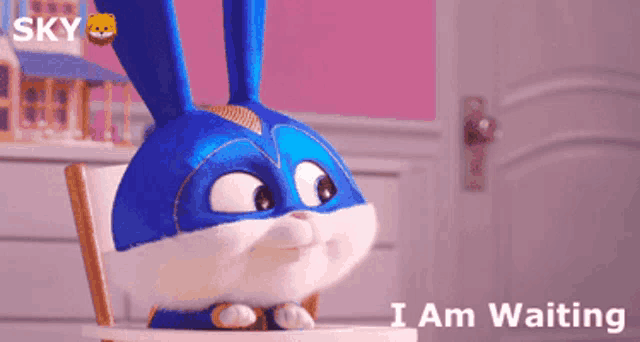 a blue bunny sitting in a chair with the words i am waiting on the bottom
