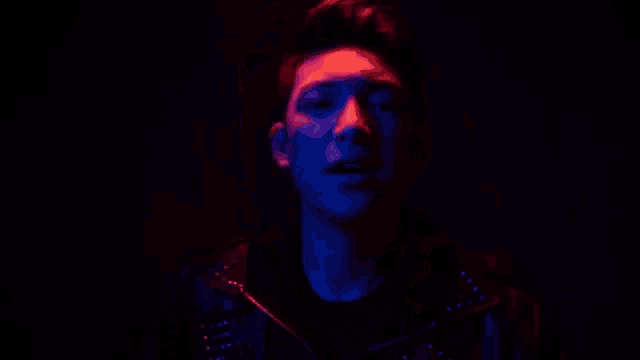 a man is saying `` you 're my favorite person '' while standing in the dark .