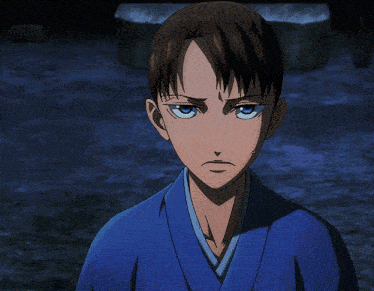 a close up of a person 's face with a ponytail and a blue shirt that says tumblr