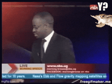 a man in a suit and tie is standing in front of a screen that says ' live morning breeze ' on it