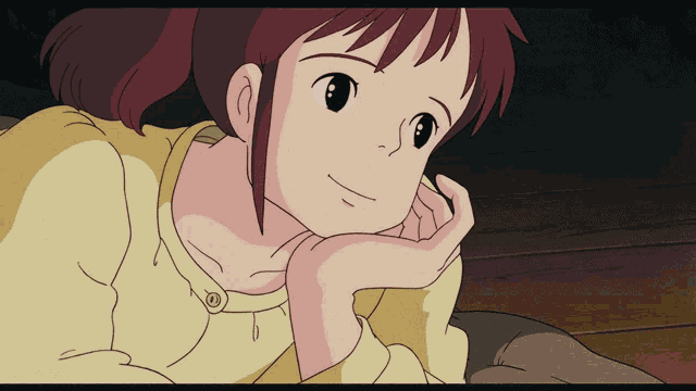 a girl with red hair is laying down with her hand on her face