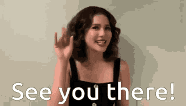 a woman in a black dress is waving her hand and says see you there