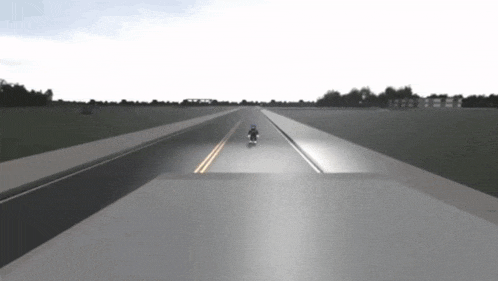 a person is riding a skateboard on a road