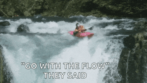a man in a kayak is going through a waterfall with the words go with the flow they said