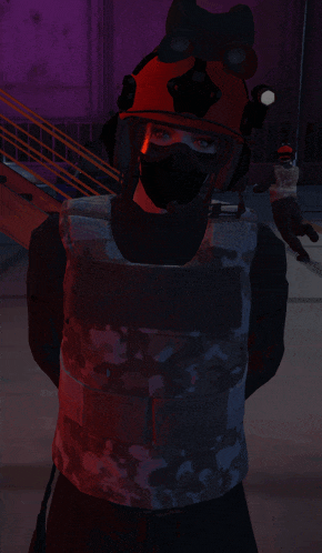 a person wearing a mask and a helmet with the letter l on it