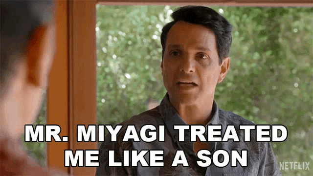 a man in a hawaiian shirt is talking to another man and saying mr. miyagi treated me like a son .
