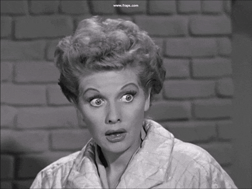a woman 's face is shown in a black and white photo with the website www.fraps.com visible in the corner