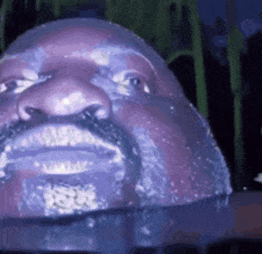 a close up of a statue of a man 's face