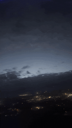 a picture of a city at night with the word shagarita on the bottom