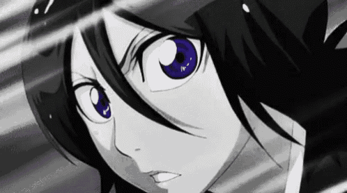a black and white drawing of a girl with purple eyes looking at the camera .
