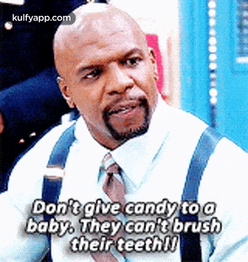 a bald man with a beard and suspenders is talking about candy .