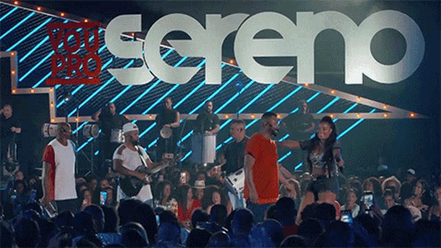 a group of people standing in front of a sign that says sereno on it