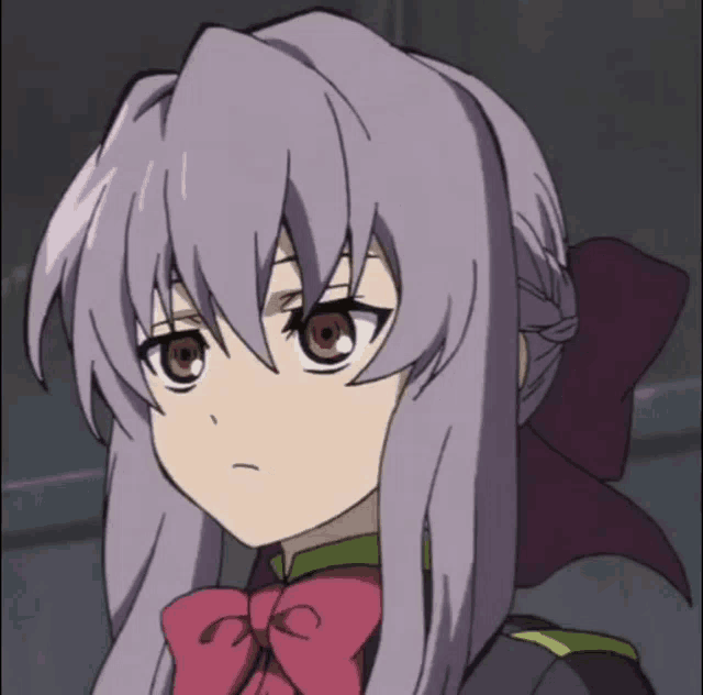 a girl with purple hair and a red bow on her head