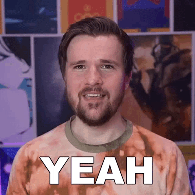 a man with a beard is wearing a shirt that says yeah