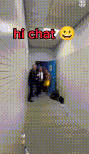 a group of people standing in a hallway with a smiley face and the words hi chat .