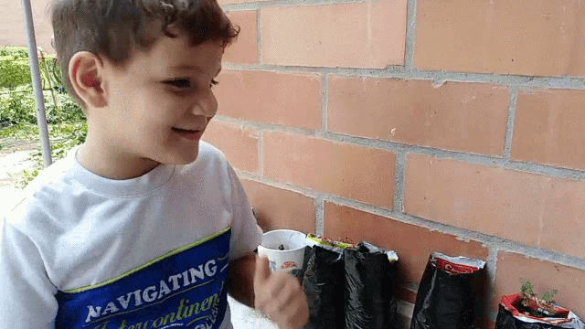 a young boy wears a shirt that says navigating