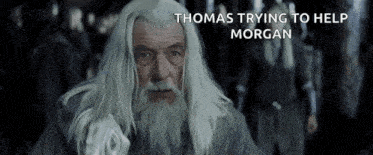 a man with long white hair and a beard is being called thomas trying to help morgan