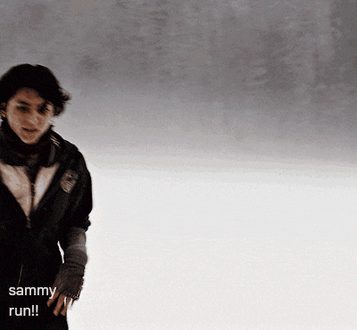 a man in a black jacket stands in front of a white background that says sammy run !!