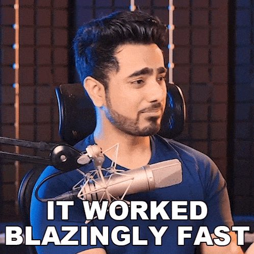 a man sitting in front of a microphone with the words " it worked blazingly fast " above him