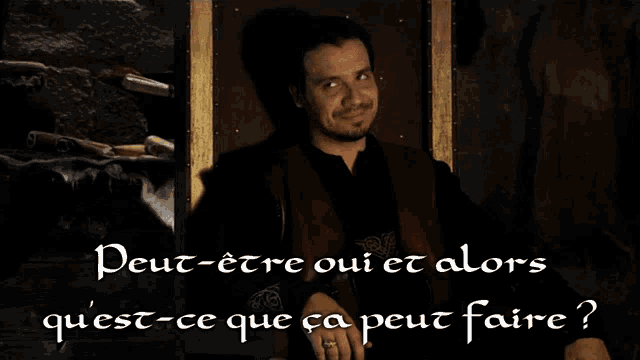 a man sitting in a chair with the words peut-etre oui et alors