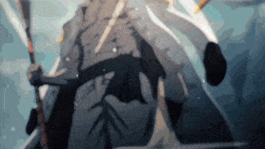 a man in a white coat is holding a stick