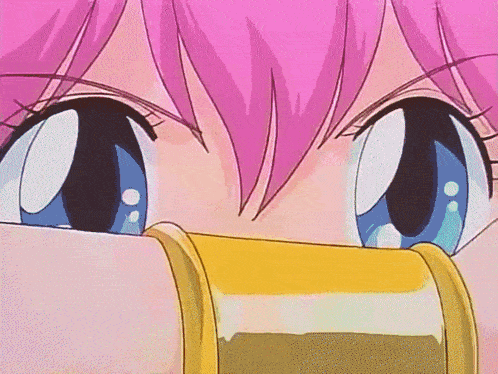 a close up of a pink haired anime girl 's eyes