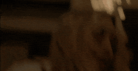 a close up of a woman with a bloody face .