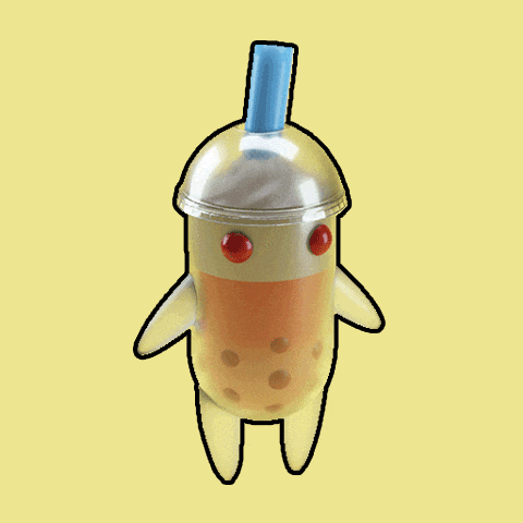 a bubble tea cup with a blue straw on top of it