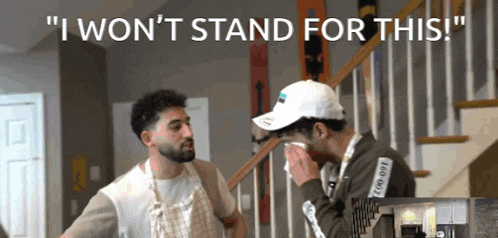 two men standing next to each other with the words " i won 't stand for this " on the top