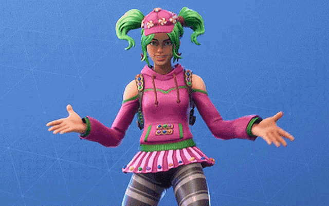 a girl with green hair is wearing a pink hoodie and striped skirt .