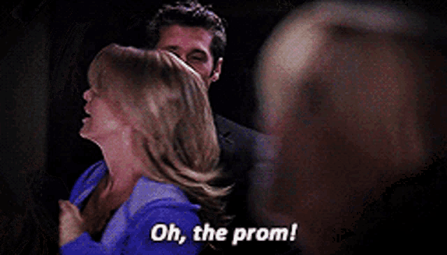 a woman in a blue shirt says " oh the prom "