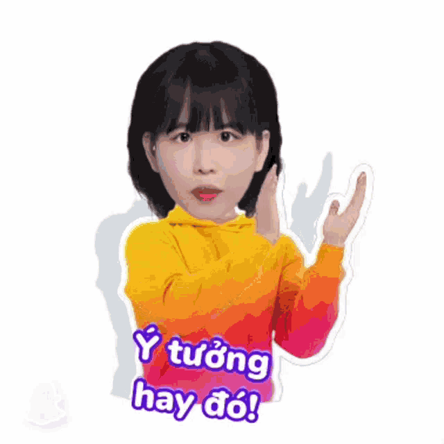 a girl in a yellow hoodie is making a peace sign with her hand .