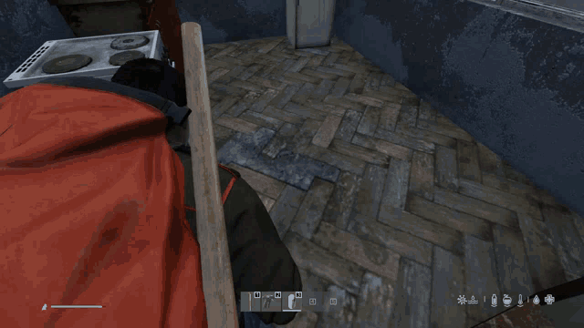 a screenshot of a video game shows a person standing on a wooden floor with a few icons on it