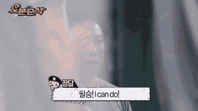 a man covering his face with his hand and a sign that says i can do