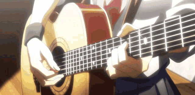 a person playing an acoustic guitar with a grid pattern on the frets