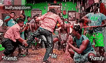 a group of men are dancing in a room with a green background .